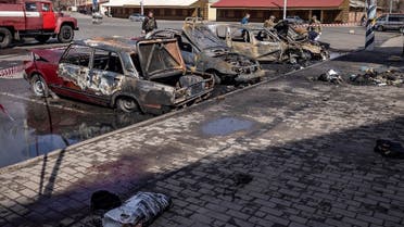 Calcinated cars are pictured outside a train station in Kramatorsk, eastern Ukraine, that was being used for civilian evacuations, after it was hit by a rocket attack killing at least 35 people, on April 8, 2022. (AFP)