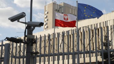 Flags of European Union and Poland fly outside the Polish embassy in Moscow, Russia March 29, 2018. (Reuters)