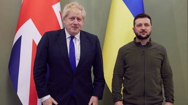 This handout picture taken and released on April 9, 2022 by Ukrainian Presidential Press Service shows Ukrainian President Volodymyr Zelenskyy (R) posing with British Prime Minister Boris Johnson ahead of their meeting in Kyiv. (AFP) 