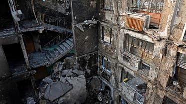 This photograph shows a partially destroyed five storey residential building in the Ukrainian city of Kharkiv, on April 10, 2022, amid the Russian invasion of Ukraine. (AFP)