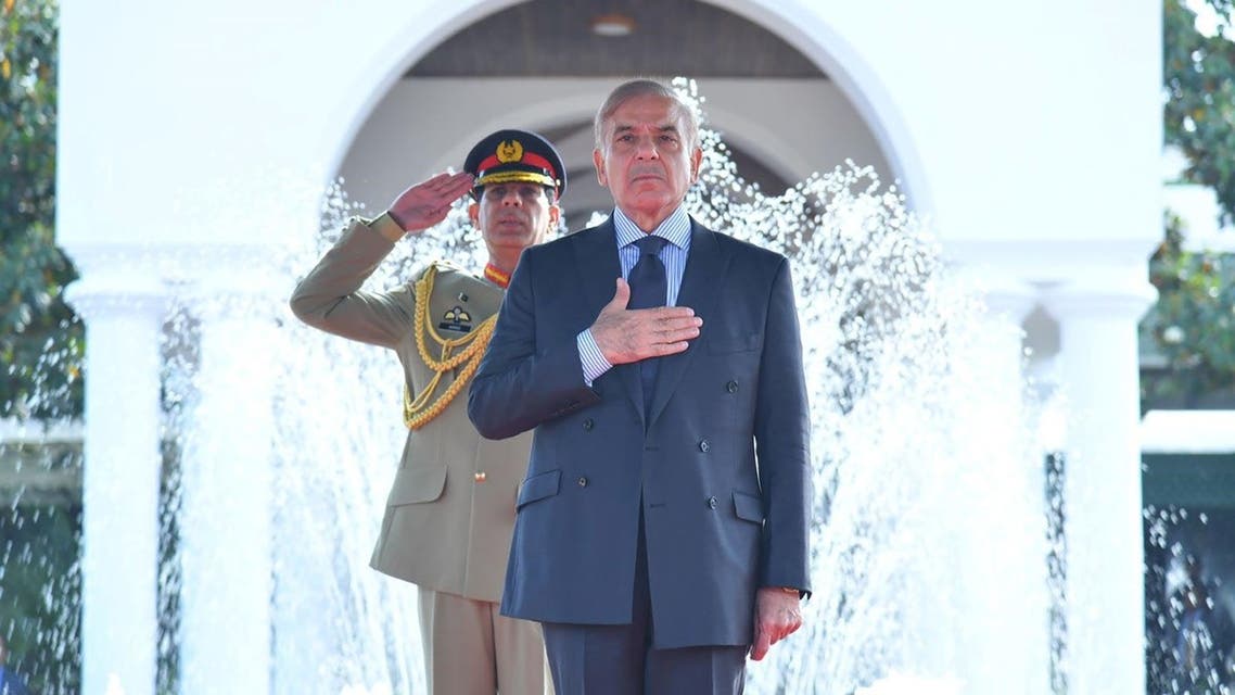 In this handout photograph released by the Press Information Department (PID) on April 12, 2022, newly elected Pakistan's Prime Minister Shehbaz Sharif reviews a guard of honor upon his arrival at the Prime Minister's House in Islamabad. (AFP)