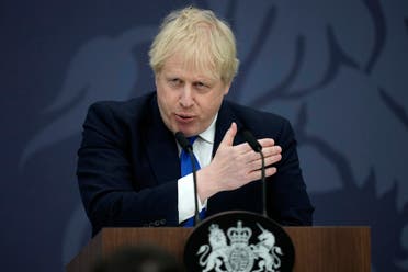 Britain's Prime Minister Boris Johnson makes a speech on immigration, at Lydd Airport, in south east England, on April 14, 2022. (AFP)