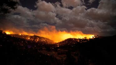 The McBride Fire burns in the heart of the village in Ruidoso, New Mexico, United States, April 12, 2022. (Reuters)