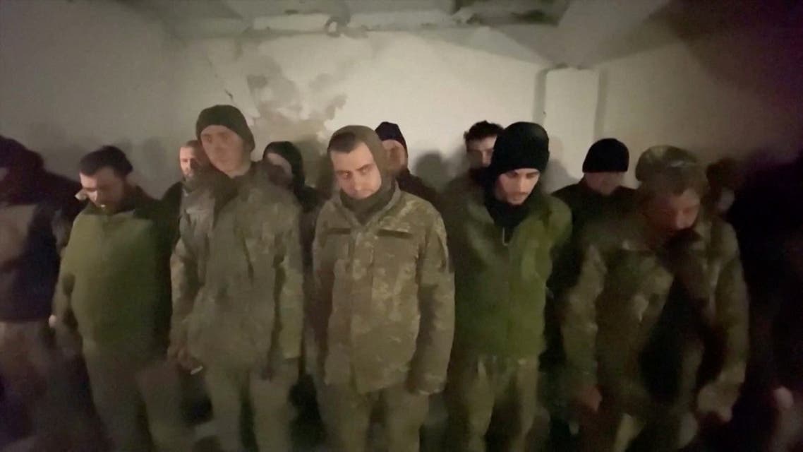 People said to be prisoners of war stand in formation in a location given as Mariupol, Ukraine, in this still image taken from video that Russian TV released April 13, 2022, and says shows Ukrainian marines surrendering in Mariupol. (File photo: Reuters)