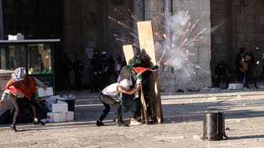 Palestinian protestors clash with Israeli security forces at the compound that houses Al-Aqsa Mosque, known to Muslims as Noble Sanctuary and to Jews as Temple Mount, in Jerusalem's Old City April 15, 2022. (Reuters)