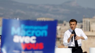 French President Emmanuel Macron, candidate for the re-election in the 2022 French presidential election, speaks during a campaign rally, in Marseille, France, April 16, 2022. REUTERS/Christian Hartmann