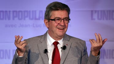 Jean-Luc Melenchon, leader of the far-left opposition party La France Insoumise (France Unbowed - LFI), and L'Union populaire (popular union) candidate for the 2022 French presidential election, gestures on stage after partial results in the first round of the 2022 French presidential election, in Paris, France, April 10, 2022. REUTERS/Sarah Meyssonnier