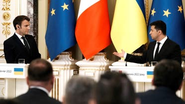 Ukrainian President Volodymyr Zelensky (R) and French President Emmanuel Macron give a joint press conference following their meeting in Kyiv on February 8, 2022. (AFP)