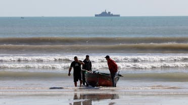 A military boat is seen near the site where a merchant fuel ship that sank off the coast of Gabes, Tunisia April 17, 2022. REUTERS/Zoubeir Souissi