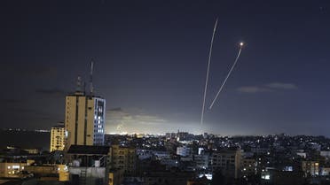 A streak of light appears as Israel's Iron Dome anti-missile system intercepts rockets launched from the Gaza Strip on May 18, 2021. (File photo: AFP)