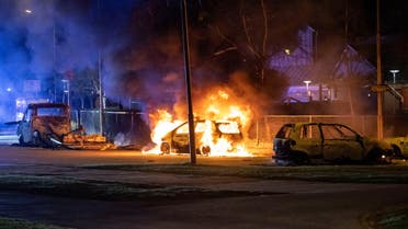 Cars are seen set on fire in Rosengard district, following Quran burnings that caused riots in several Swedish towns over the Easter weekend, in Malmo, Sweden April 17, 2022. Picture taken April 17, 2022. Johan Nilsson/TT News Agency/via REUTERS ATTENTION EDITORS - THIS IMAGE WAS PROVIDED BY A THIRD PARTY. SWEDEN OUT. NO COMMERCIAL OR EDITORIAL SALES IN SWEDEN.