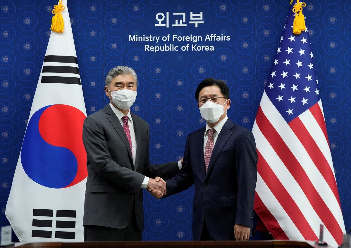 US Special Representative for North Korea, Sung Kim shakes hands with South Korea’s Special Representative for Korean Peninsula Peace and Security Affairs Noh Kyu-duk during a meeting at the Foreign Ministry in Seoul, South Korea, on April 18, 2022. (Reuters)