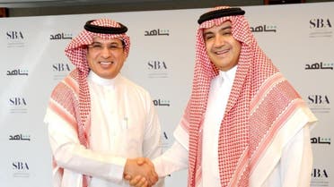 CEO of the Radio and Television Corporation, Mohammed Fahad al-Harthi, and MBC Chairman Sheikh Waleed Al Ibrahim sign a strategic partnership. (Twitter)