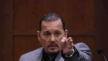 Actor Johnny Depp testifies during his defamation trial against Amber Heard at the Fairfax County Circuit Courthouse in Fairfax, Virginia, on April 20, 2022. (AFP)