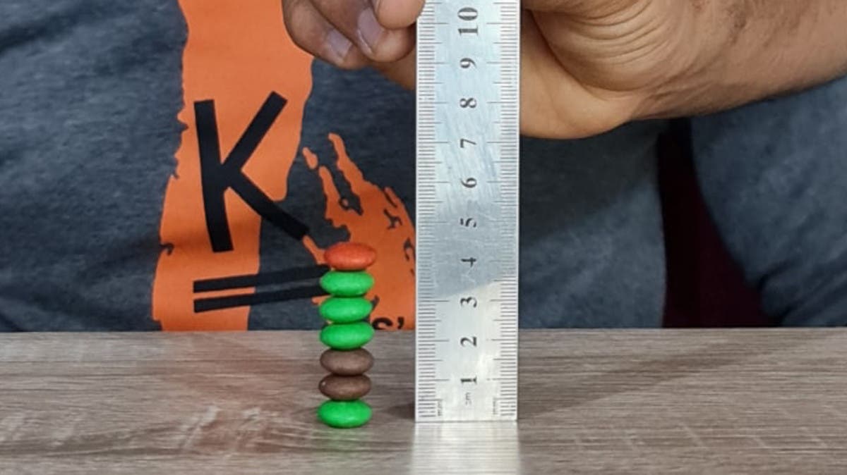 WATCH: How many M&Ms can you stack? This guy broke the Guinness World  Record!