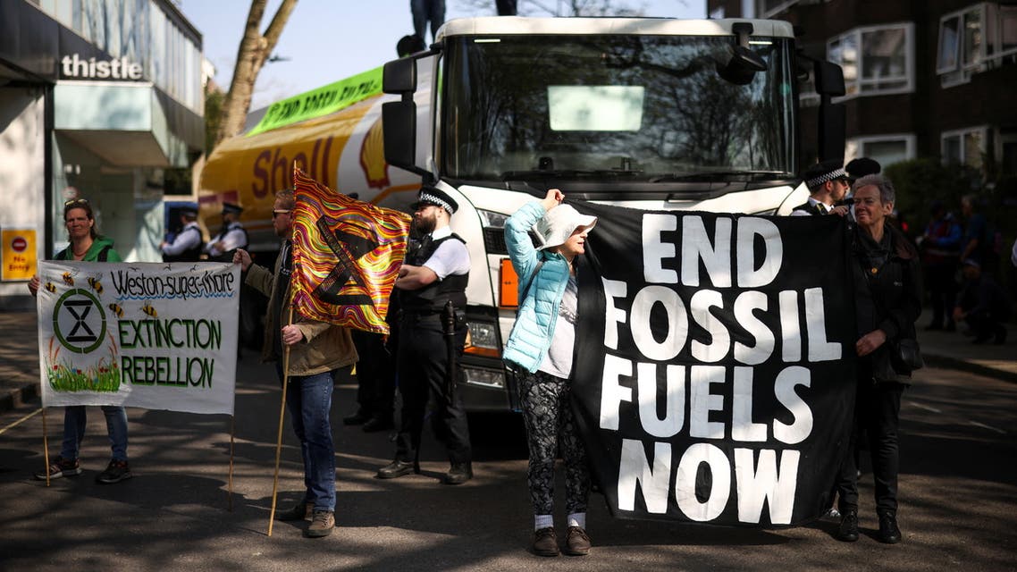 Activists from Extinction Rebellion occupy an oil tanker during a protest calling for an end to fossil fuels, in central London, Britain, April 16, 2022. (Reuters)