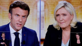 Macron warns Le Pen risks ‘civil war’ with headscarf ban 
