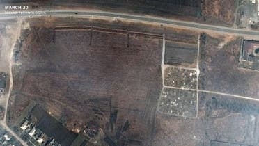 صور أقمار صناعية تظهر توسعا بمقبرة ضخمة في ماريوبول مارس 30