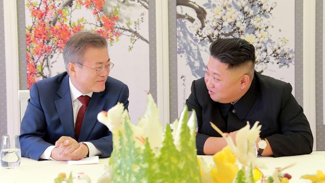 This picture taken on September 20, 2018 and released by Korean Central News Agency (KCNA) via KNS shows This picture taken on September 20, 2018 and released by Korean Central News Agency (KCNA) via KNS shows North Korea's leader Kim Jong Un (R) talking to South Korean President Moon Jae-in (L) during a visit to Samjiyon guesthouse near Mount Paektu in Samjiyon. (AFP)
