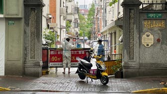 Shanghai fences up COVID-hit areas, fueling fresh outcry