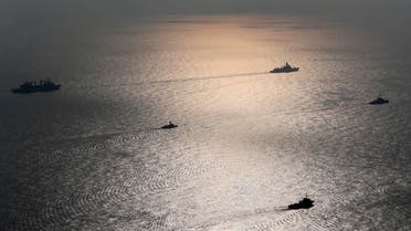 Warships attend a joint naval exercise of the Iranian, Chinese and Russian navies in the northern Indian Ocean January 19, 2022. Picture taken January 19, 2022. Iranian Army/WANA (West Asia News Agency) via REUTERS ATTENTION EDITORS - THIS IMAGE HAS BEEN SUPPLIED BY A THIRD PARTY.