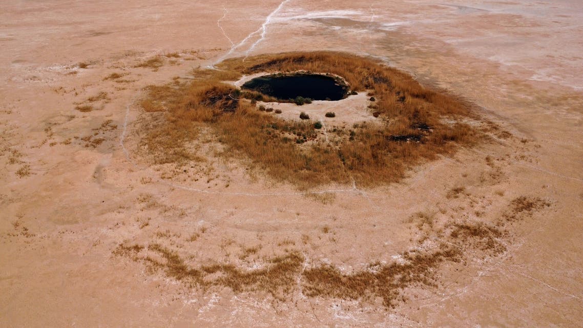 An aerial view shows a pond remaining at the dried-up Sawa Lake in Iraq's southern province of al-Muthanna on April 19, 2022. (AFP)