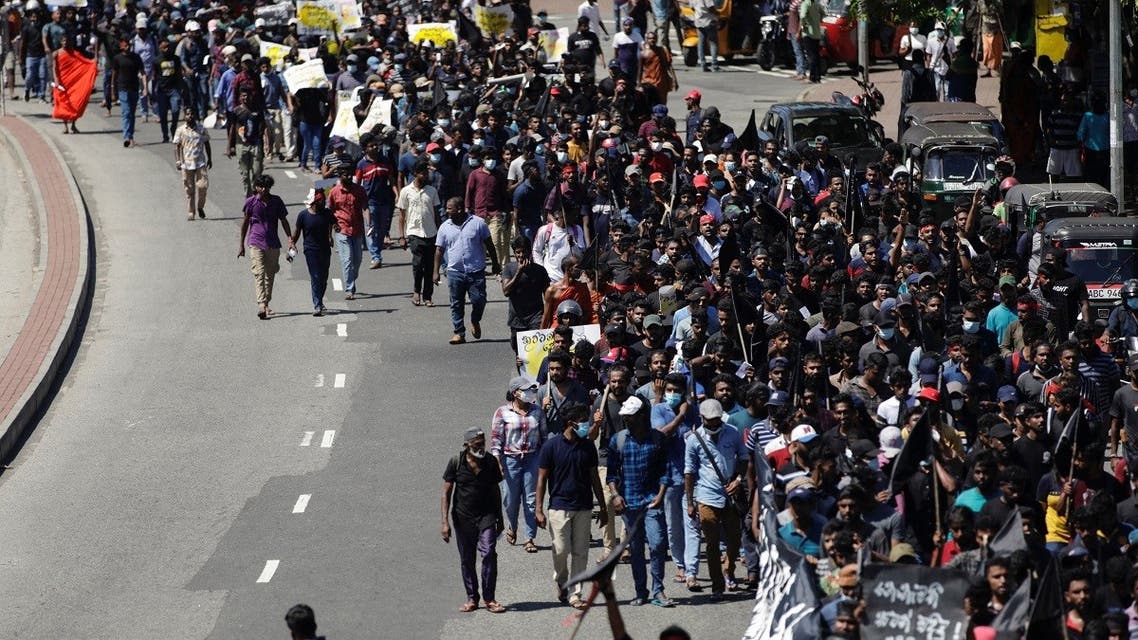 Demonstrators march towards the Sri Lankan Prime Minister Mahinda Rajapaksa's residence during a protest, amid the country's economic crisis, in Colombo, Sri Lanka, on April 24, 2022. (Reuters)