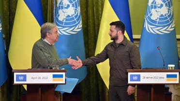 Ukrainian Preident Volodymyr Zelensky (R) and UN Secretary-General Antonio Guterres shake hands at the end of a joint press conference following their talks in Kyiv on April 28, 2022. (AFP)
