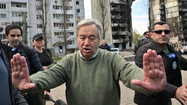 UN Secretary-General Antonio Guterres (C) gestures during his visit in Borodianka, outside Kyiv, on April 28, 2022. (AFP)