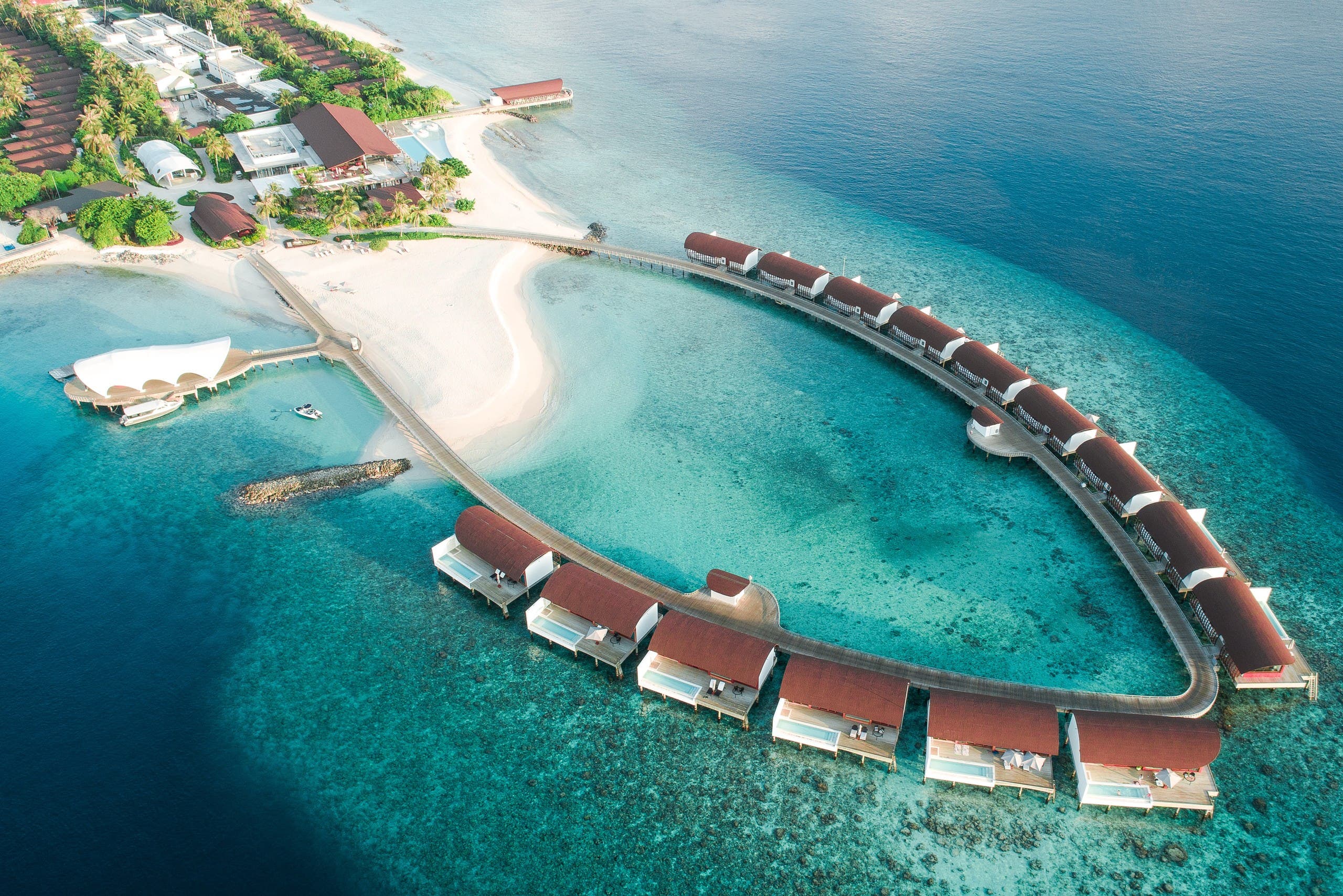 Water villas at The Westin Maldives Miriyandhoo Resort. (Unsplash, Ahmed Yaaniu)
