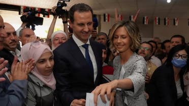 Asma, wife of Syria's President Bashar al-Assad, casts her vote during the country's presidential elections in Douma, Syria, in this handout released by SANA on May 26, 2021. (File photo: Reuters)