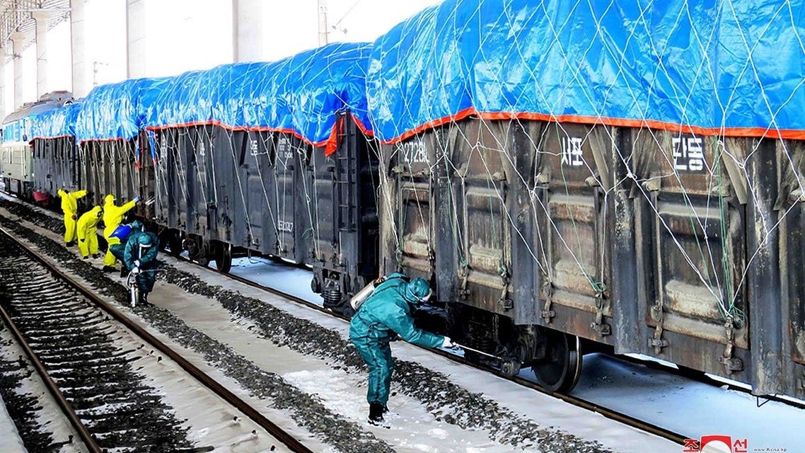 This undated picture released from North Korea’s official Korean Central News Agency (KCNA) on March 4, 2020 shows workers disinfecting freight trains to prevent the spread of the COVID-19 coronavirus in Sinuiju, North Pyongan Province. (File photo: AFP) 