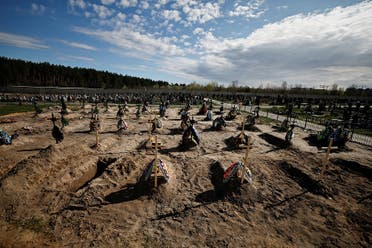 مقابر جماعية في منطقة بوتشا الاوكرانية - رويترز