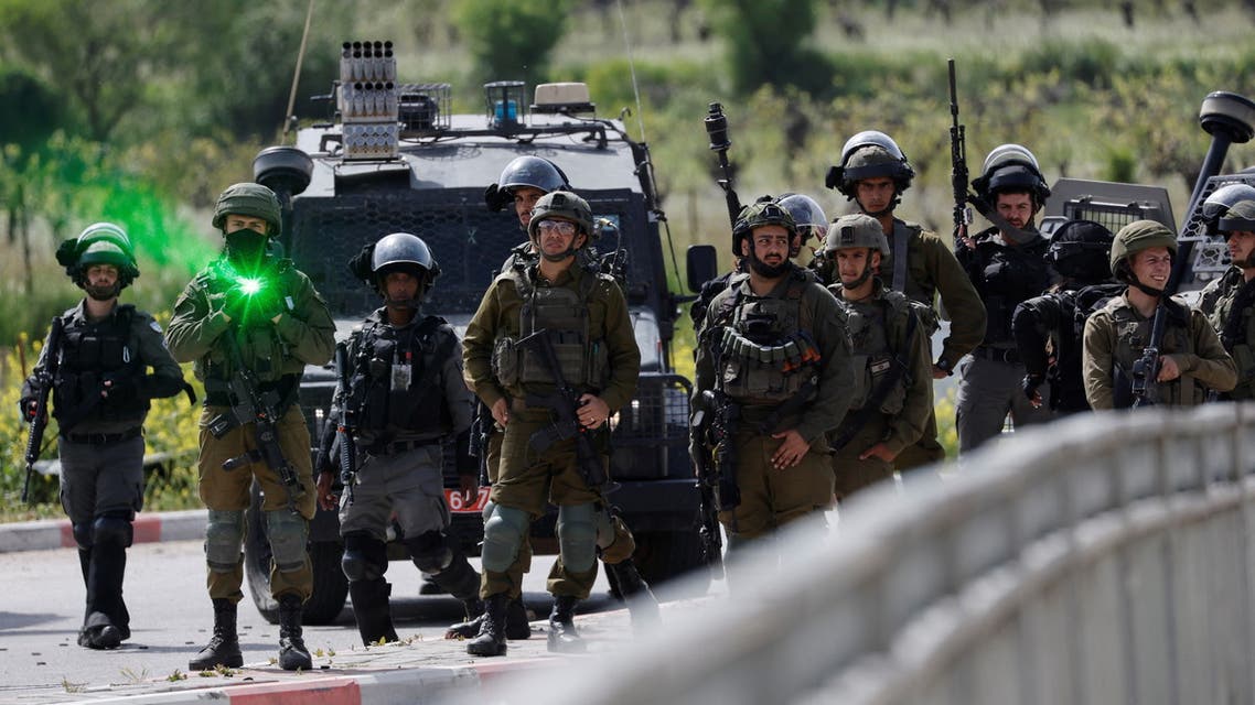 Israeli forces stand guard at a protest, following the funeral of Palestinian Mohammed Ghoneim, who medics say was killed by Israeli forces, near Bethlehem, in the Israeli-occupied West Bank April 11, 2022. (File photo: Reuters)