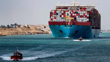 A shipping container passes through the Suez Canal in Suez, Egypt February 15, 2022. Picture taken February 15, 2022. REUTERS/Mohamed Abd El Ghany