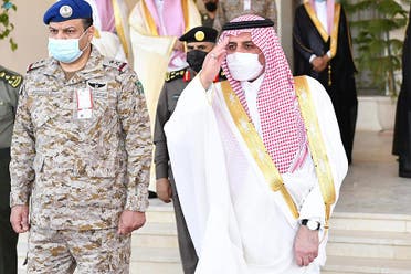 Prince Fahd bin Sultan, governor of Tabuk Region, salutes military personnel at the start of Eid al-Fitr in Tabuk, Saudi Arabia on May 2, 2022. (SPA)
