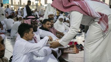 Worshippers are given food at the Prophet's Mosque in Medina, Saudi Arabia on May 2, 2022. (SPA)