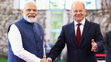German Chancellor Olaf Scholz shakes hands with Indian Prime Minister Narendra Modi ahead of the German-Indian government consultations at the Chancellery in Berlin, Germany, on May 2, 2022. (Reuters)
