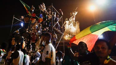 Senegal’s fans celebrate after winning the Africa Cup of Nations 2021 final match between Egypt and Senegal in Dakar, Senegal, on February 6, 2022. (Reuters)