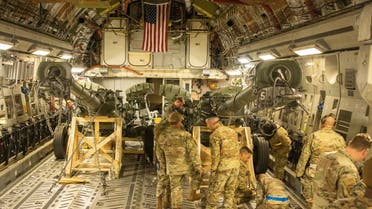 US Marines load an M777 towed 155 mm howitzer into the cargo hold of a U.S. Air Force C-17 Globemaster III transport plane, to be delivered in Europe for Ukrainian forces, at March Air Reserve Base, California, US April 21, 2022. (Reuters0
