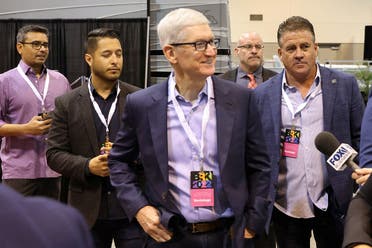 Apple CEO Tim Cook arrives for the first in-person annual meeting since 2019 of Berkshire Hathaway Inc in Omaha, Nebraska, US, on April 30, 2022. (Reuters)