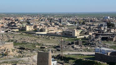 A picture taken on February 4, 2019, shows a general view of damaged buildings in the northern Iraqi town of Sinjar. For decades in the mountainous region of Sinjar in Iraq's diverse north, the lives of many revolved around their lands, but now many Sunni Arab farmers are estranged from their fields out of fear of reprisal attacks. The region, which borders Syria is home to an array of communities -- Shiite and Sunni Arabs, Kurds, and Yazidis -- which formed a patchwork that was ripped apart when the Islamic State group rampaged in 2014, and has not reconciled even long after Iraqi forces ousted IS in 2017. / AFP / Zaid AL-OBEIDI
