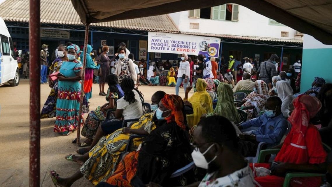 People wait to receive a dose of coronavirus disease vaccine at Philippe Senghor Hospital in Dakar, amid a surge of coronavirus cases in Senegal, on July 28, 2021. (Reuters)