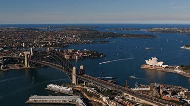 Boats navigate next to the Sydney Opera House and the Harbour Bridge on a sunny winter afternoon in Sydney August 24, 2013. (File photo: Reuters)