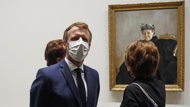French President Emmanuel Macron visits the exhibition 'The Morozov Collection, Icons of Modern Art' at Foundation Louis Vuitton in Paris, France, on September 21, 2021. (Reuters)