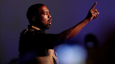 FILE PHOTO: Rapper Kanye West gestures to the crowd as he holds his first rally in support of his presidential bid in North Charleston, South Carolina, U.S. July 19, 2020. REUTERS/Randall Hill/File Photo