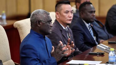 Solomon Islands Prime Minister Manasseh Sogavare talks to Chinese President Xi Jinping (not pictured) during their meeting at the Diaoyutai State Guesthouse in Beijing, China, October 9, 2019. (File photo: Reuters)