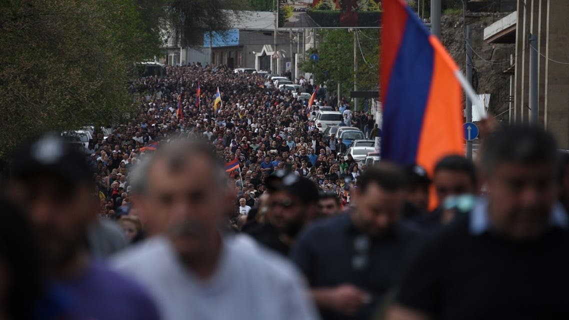Demonstrators take part in an opposition rally held to protest against the Nagorno-Karabakh concession in Yerevan on May 4, 2022. (Reuters)