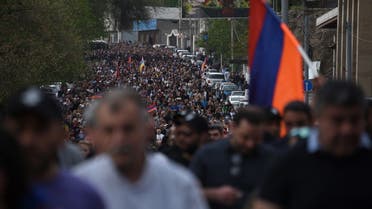 Demonstrators take part in an opposition rally held to protest against the Nagorno-Karabakh concession in Yerevan on May 4, 2022. (Reuters)
