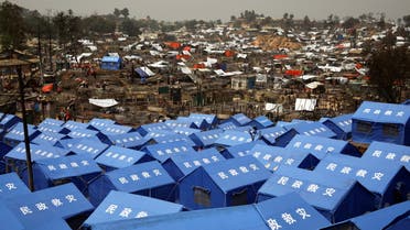 Newly built makeshift tents are seen at the Rohingya refugee camp where a massive fire destroyed thousands of shelters in Cox's Bazar, Bangladesh, March 24, 2021. REUTERS/Mohammad Ponir Hossain